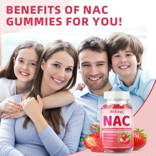 Chewable strawberry flavored NAC gummies poured out on surface