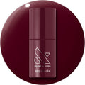 Olive and June gel nail polish bottle front view showing dark ruby red shade Obsessed