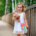 Civan small pop bag side angle displaying the adjustable colorful nylon strap