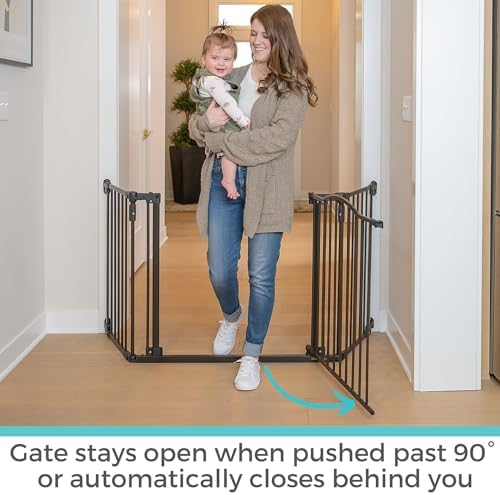 Extra wide metal baby gate installed across a large open hallway.
