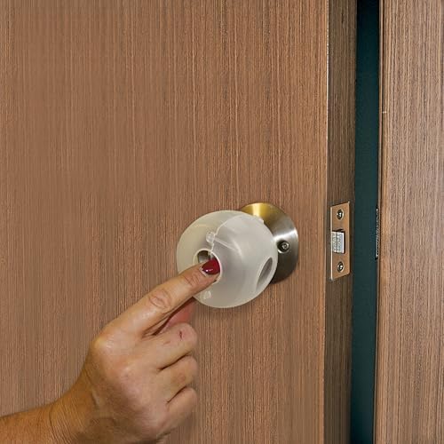 Three pack of imported Dreambaby home child safety locks laid out flat