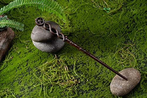 Close up of hand carved wood texture on magic wand