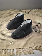 Silverts adaptive house shoes for seniors in navy blue polar fleece fabric.