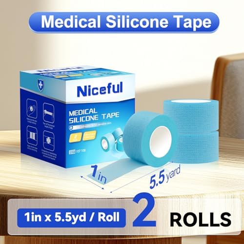 Two rolls of blue surgical silicone adhesive tape showing the breathable non woven texture