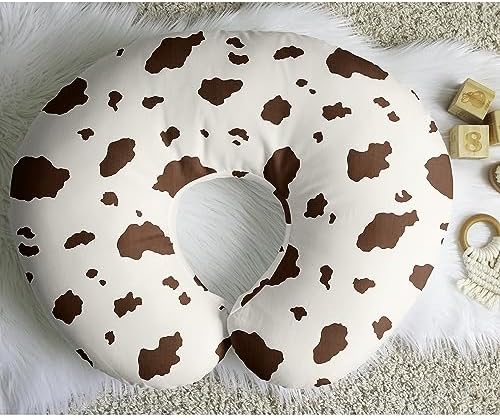 Detailed view of stretch jersey fabric texture on cow print pillow cover