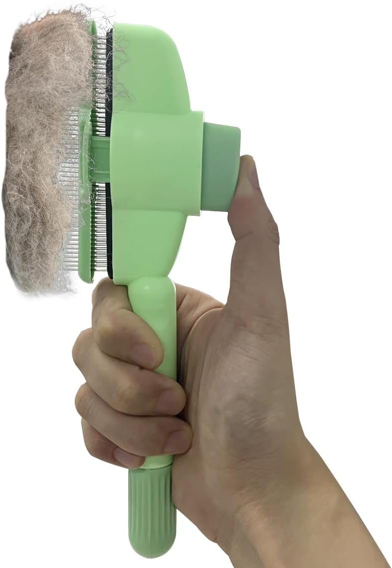 Ergonomic non-slip handle of green pet grooming tool