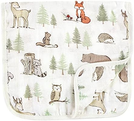 Folded forest animal print burp cloths in a stack