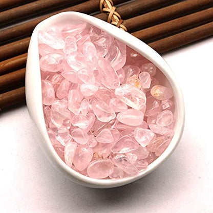 Natural pink quartz stones displayed next to a 460 gram label