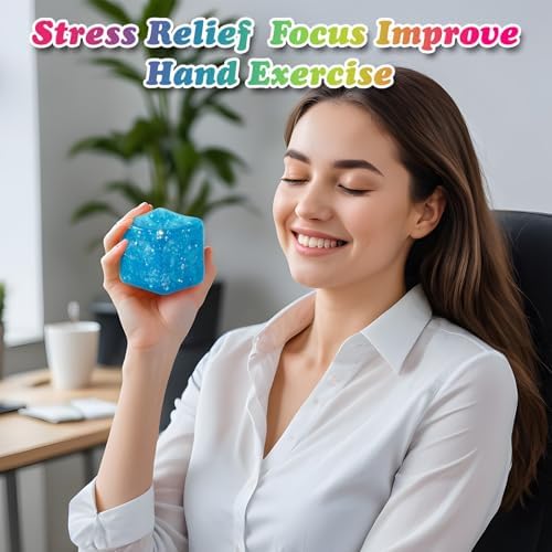 Child opening a classroom treasure box containing the vibrant pink and blue square stress cubes