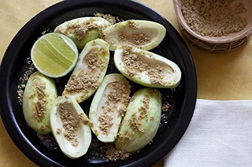 Imported Latin American pepita spice powder close up view.