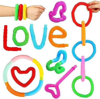 Child hands twisting and interlocking several multicolored sensory tubes into a wearable bracelet accessory