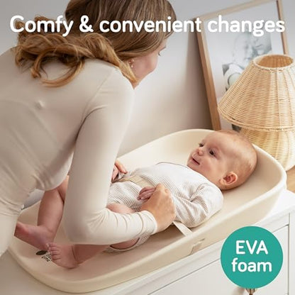 Baby Uma EVA foam changing pad on nursery dresser