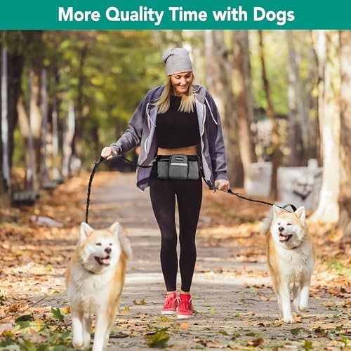 Active person running with two dogs using PetAmi gear