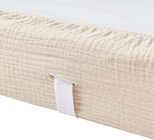 DONOMILO ultra soft breathable baby essentials cover spread out flat to display its universal sizing shape.