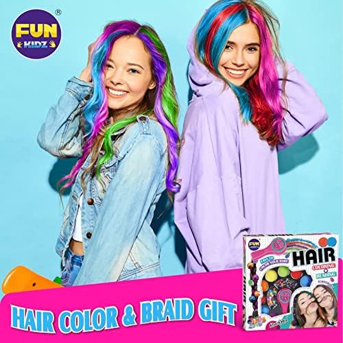 Young girl demonstrating the temporary hair coloring application using the pink styling tool clamp