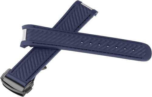 Blue curved end rubber watch strap close up showing stainless steel deployment buckle