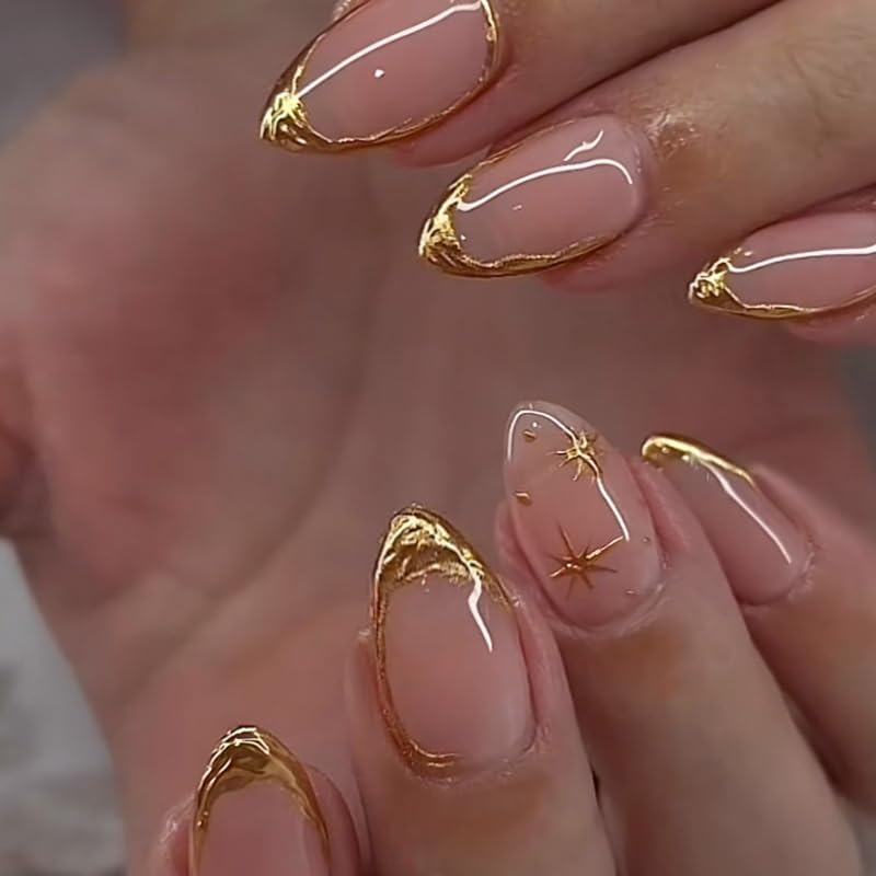 Erico short almond press on nails with gold star french tip design front view