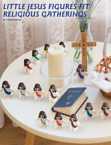 Ten different color variations of the tiny baby Jesus statues arranged neatly to highlight the variety.