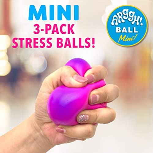 A hand squeezing the pink sensory toy to demonstrate the vibrant purple color transformation.