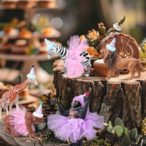 Top view of elephant and zebra cake toppers