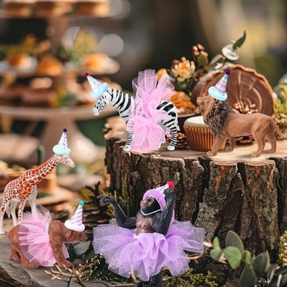 Top view of elephant and zebra cake toppers