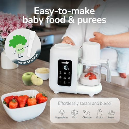 BPA-free automatic baby food maker warming a baby bottle inside the chamber