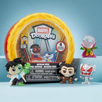 A group display of several unique series 2 figures arranged together as a superhero tabletop collection.