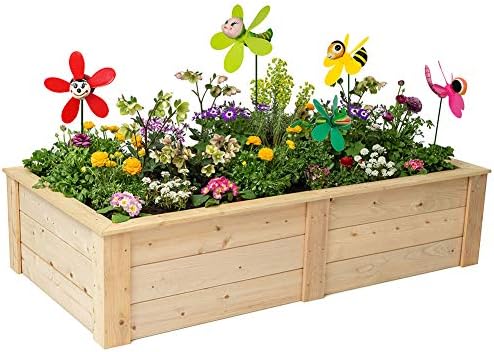 Sunpro colorful 3D ladybug and frog wind spinners in flower bed