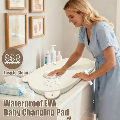 Fleufab waterproof EVA changing pad on nursery dresser