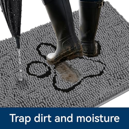 Bcoimo muddy paws door mat placed near a home entryway with a dog stepping on it