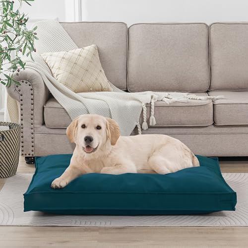 Venessco tear resistant dog mattress protector being wiped clean with a damp cloth.