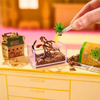 Assembled gerbil with rocket tunnel miniature pet habitat showcase on a transformed capsule display base