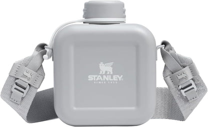 Stanley eco-friendly single wall metal canteen standing upright on a flat surface.