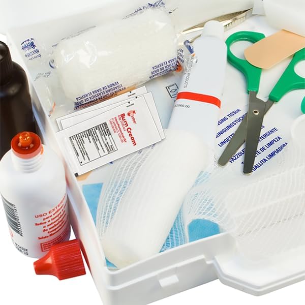 Portable first aid burn cream sachets stored in a car medicine kit