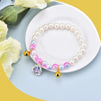 Ancnoz small dog jewelry accessory with golden bell detailing.