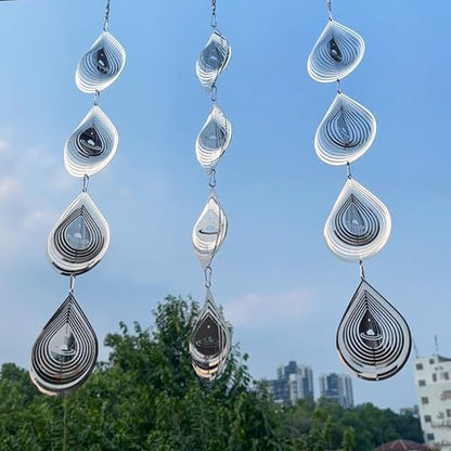 Detail view of water droplet shaped metal wind spinner
