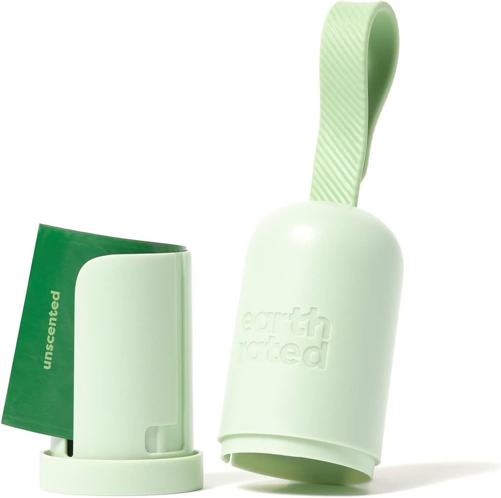 Earth Rated green leash dispenser with the adjustable silicone strap attached to a dog lead