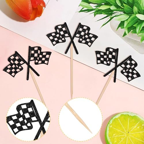 Checkered flag cupcake toppers arranged on a tray for birthday party