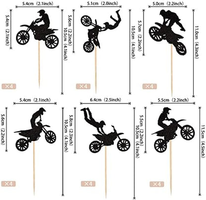 Close up view of dirt bike rider cupcake picks on display