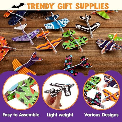 Twelve unique festive airplane designs including bat and skeleton patterns.
