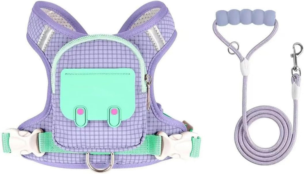 Small dog wearing pink reflective harness backpack in outdoor setting