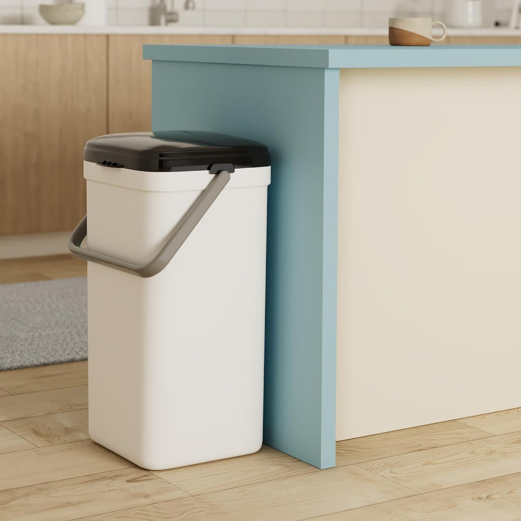 PetFusion pet waste trash can showing locking handle mechanism