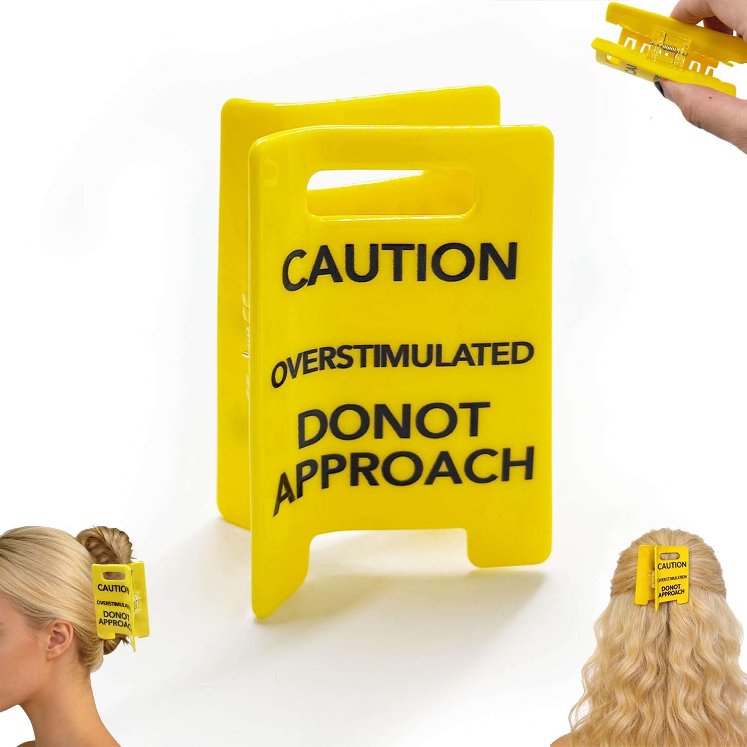 Generic overstimulated caution sign hair claw clip front view showing yellow wet floor sign design.