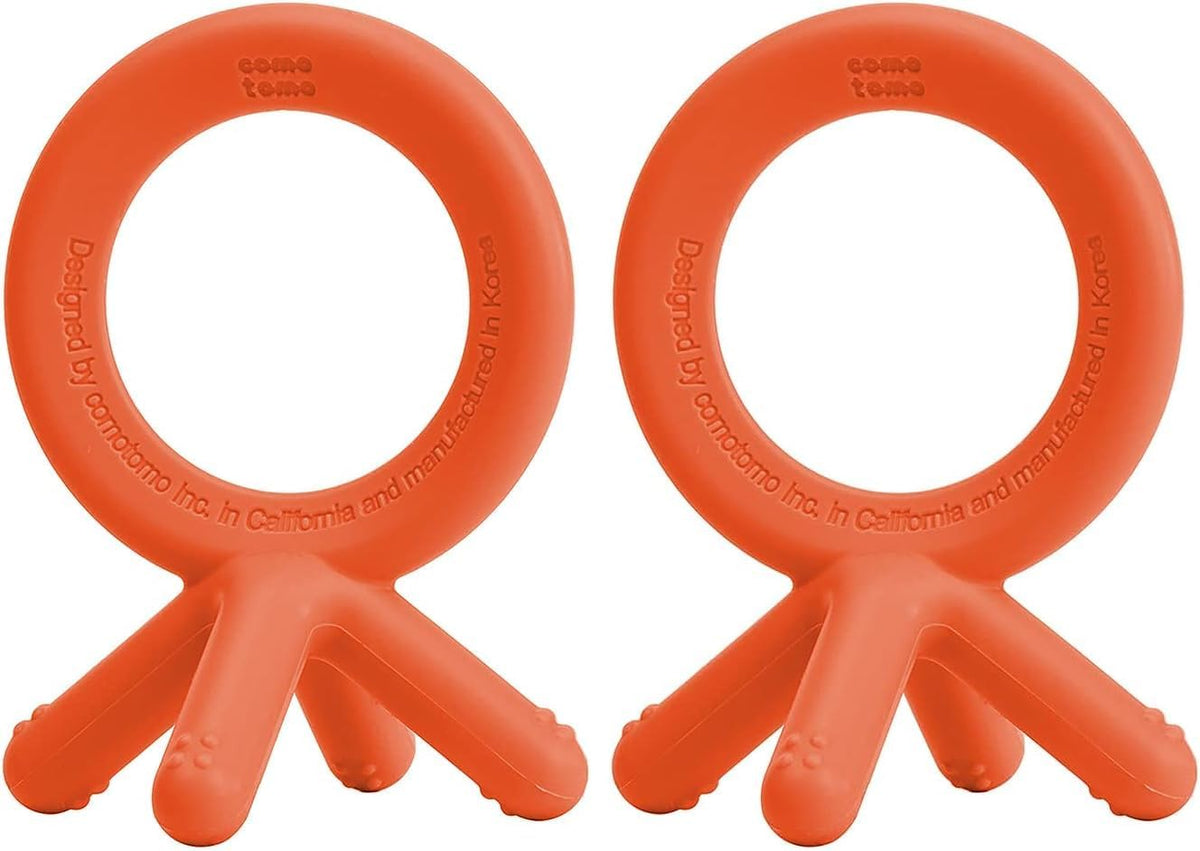Back view of the authentic Comotomo silicone infant teether in light blue