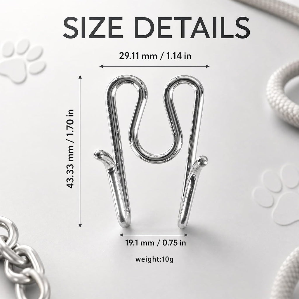 Five pieces of silver metal extra links for training collars laid out on white background