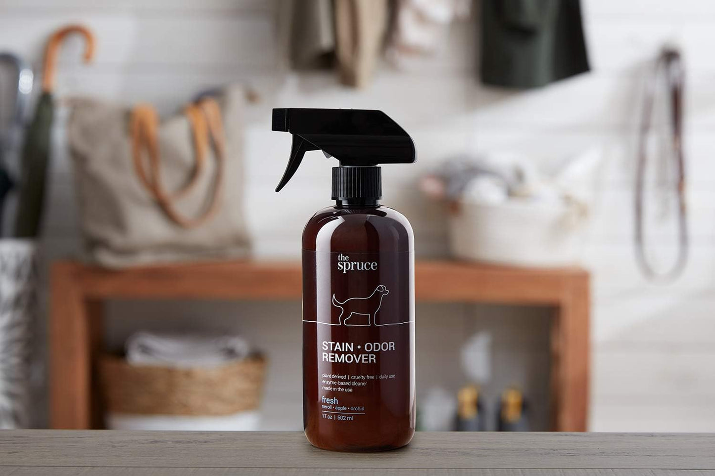 The Spruce enzyme based pet cleaner spray on hardwood floor stain removal
