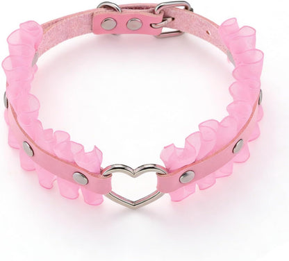 Close up of heart charm and lace edge on cat collar