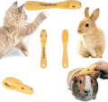 HuggleBrush Original Yellow small pet grooming brush front view on finger