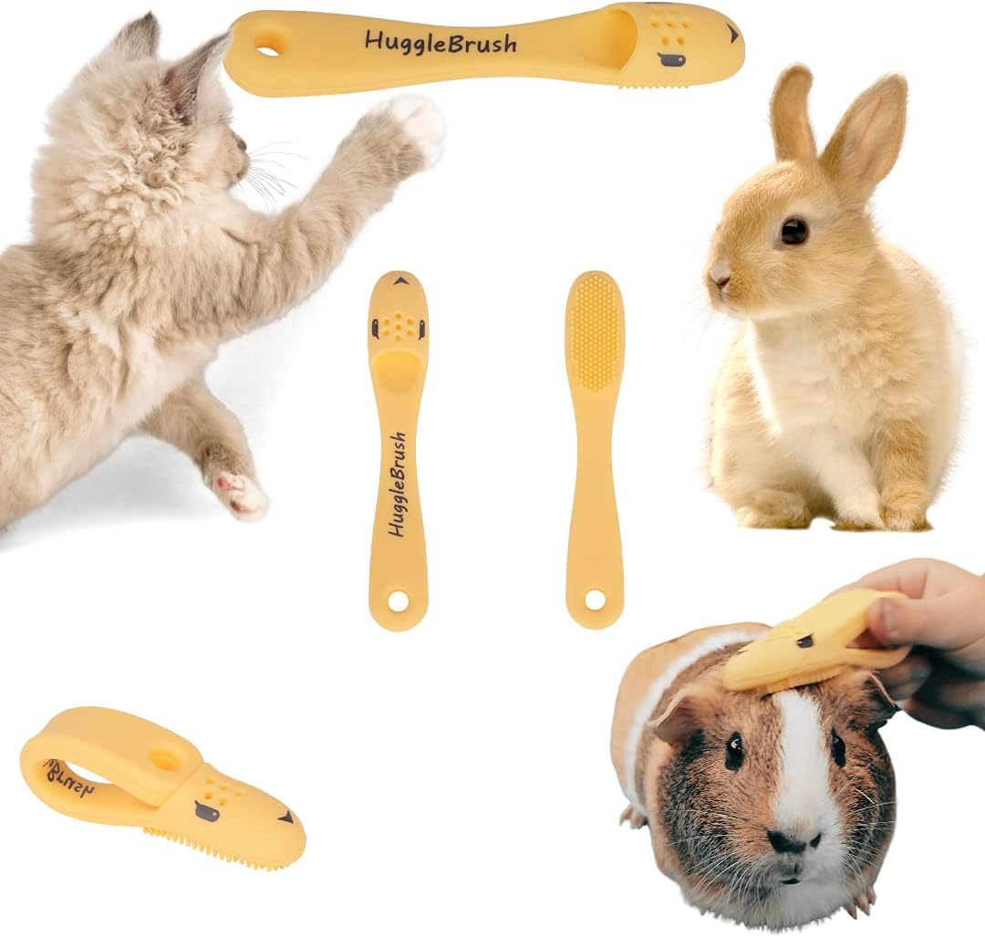 HuggleBrush Original Yellow small pet grooming brush front view on finger