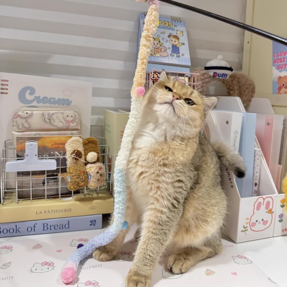 Three pieces of colorful kitty playing sticks organized together
